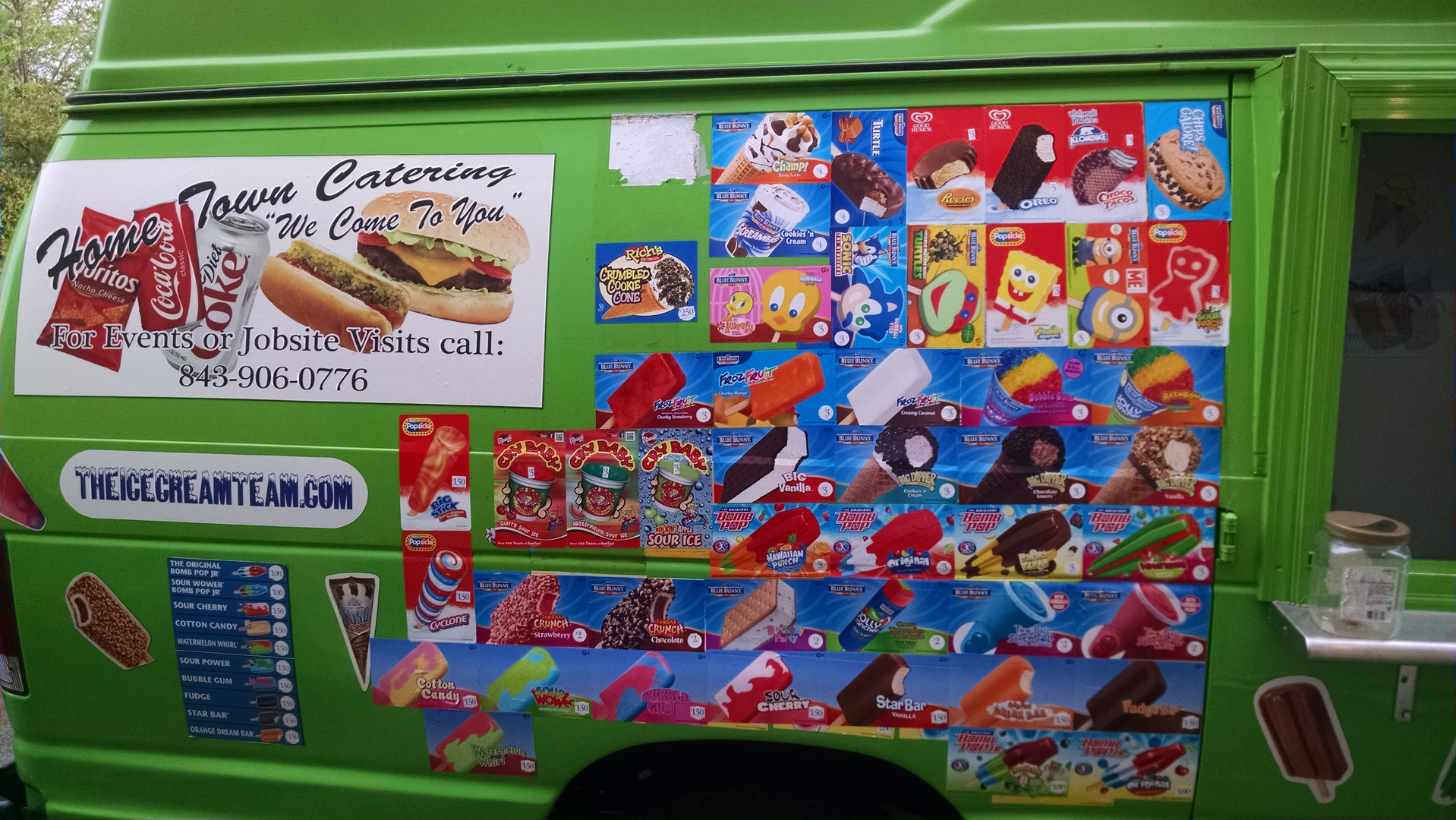 Two of our trucks serving a crowd at an outdoor event